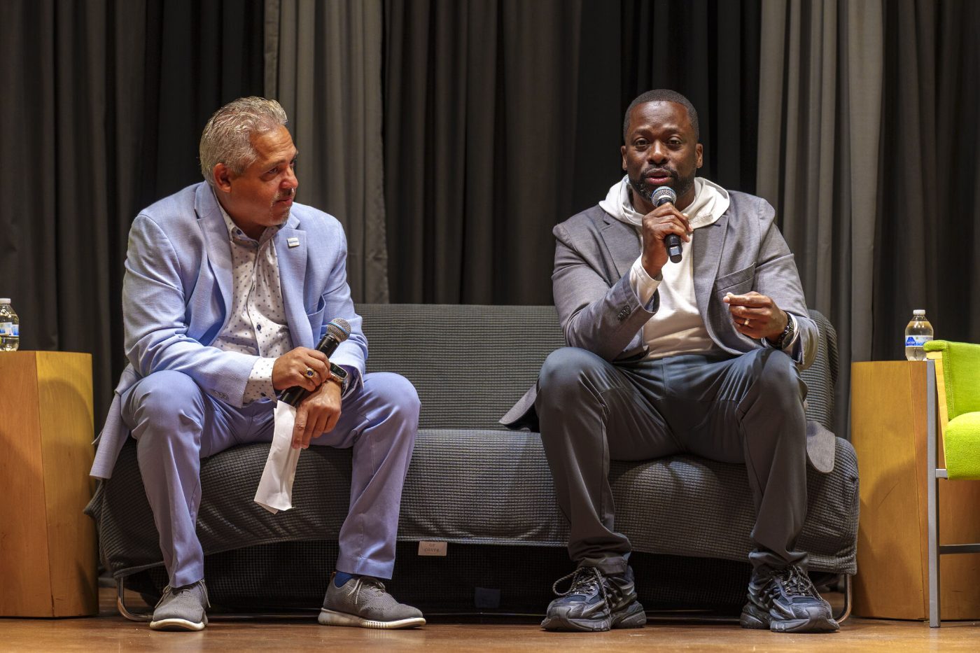 Justin Turk in the Urban Alliance Detroit fireside chat, seated on stage with the moderator.